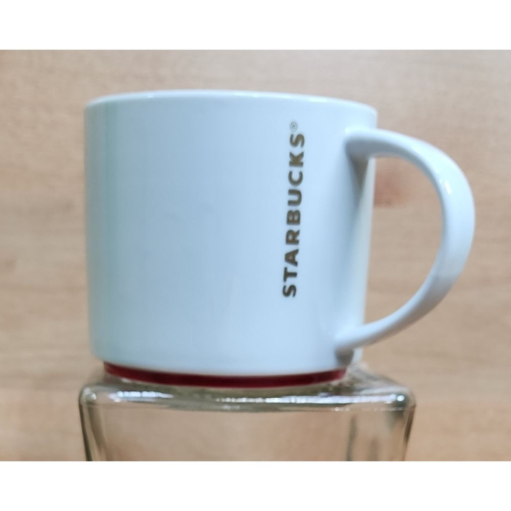 Starbucks 2012 White Gold Lettering Coffee Mug Red Lined Bottom 16 oz